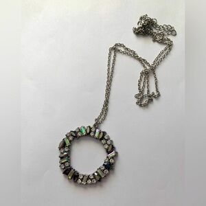 Gorgeous silver pendant necklace with ab and oil slick style rhinestones